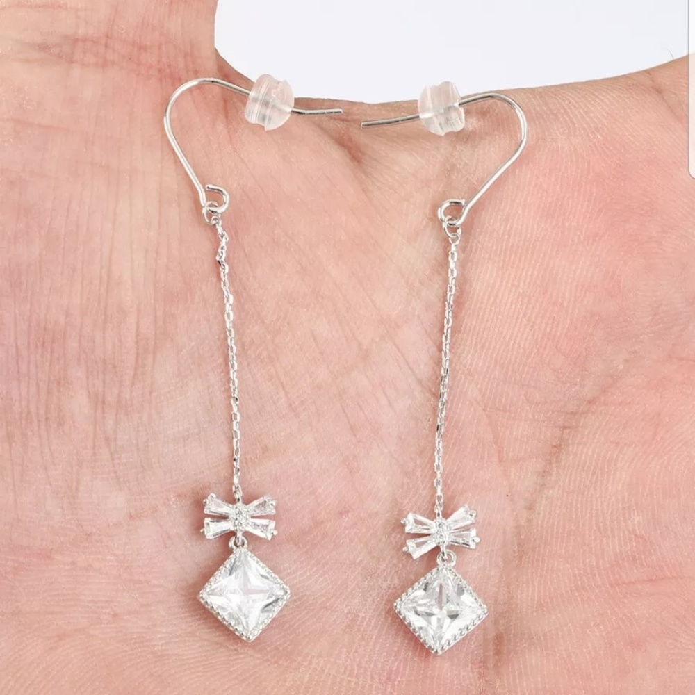 White baguette bows & emerald cut topaz earrings